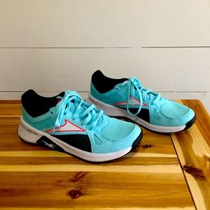 Reebok Woman’s Advanced Trainer. Digital Glow. Fuel foam.